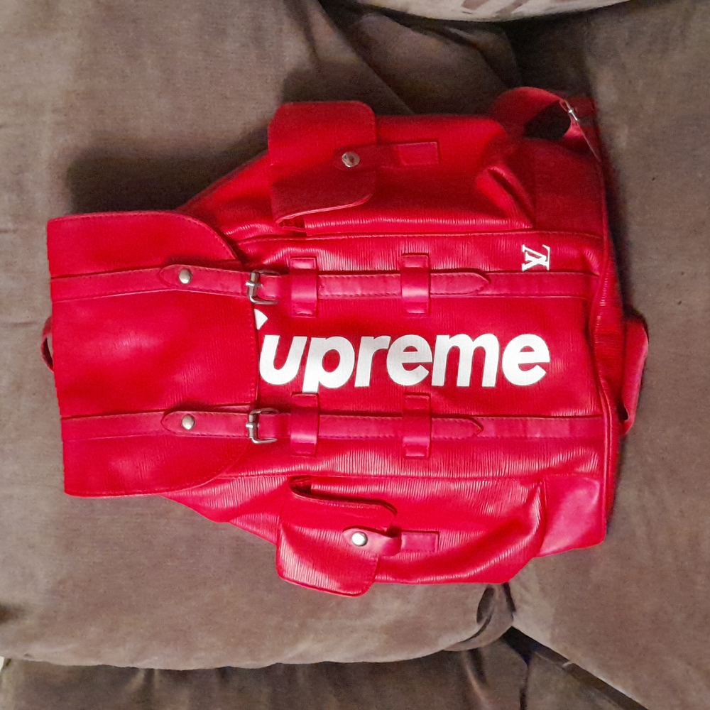 Red Supreme Louis Vuitton backpack